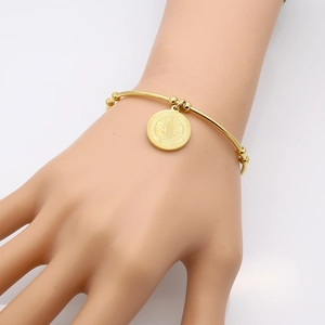 18k gold plated stainless steel bangle with St. Benedict medal and golden beads