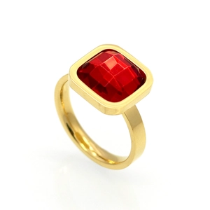 Detailed view of square red zircon stone set on a polished gold-plated ring band