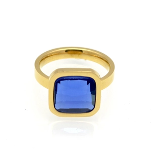 Close-up of a gold ring featuring a large square blue zircon stone on white background
