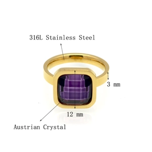 Macro detail of square purple Austrian Crystal on a 316L gold stainless steel ring