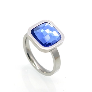 Elegant silver ring featuring a large square blue zircon stone on a polished band