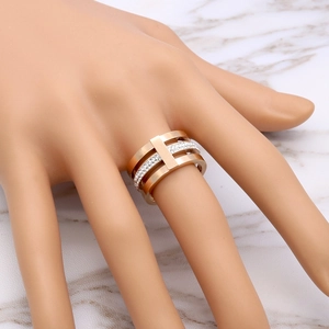 Elegant 18k rose gold plated triple layer ring featuring sparkling pavé diamond accents