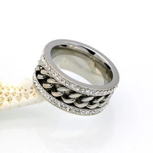 Detail of silver chain link stainless steel ring featuring double rows of micro-pave crystals