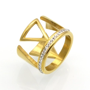 Detailed close-up of a gold V-shaped titanium steel ring with sparkling zircon inlay