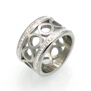 Polished silver infinity ring with double row cubic zirconia accents and cut-out pattern