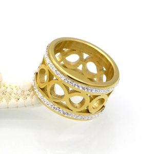 Detail of gold titanium steel ring with double-row diamonds and infinity 8 symbol