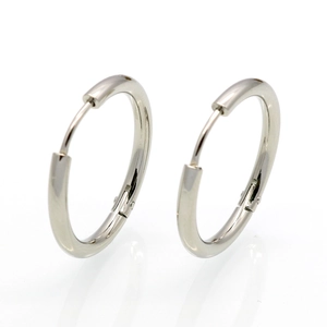 Minimalist silver hoop earrings for men and women with polished finish on white background