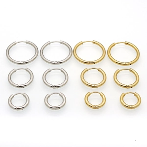 Classic gold and silver hoop earrings in three sizes with secure snap closure design