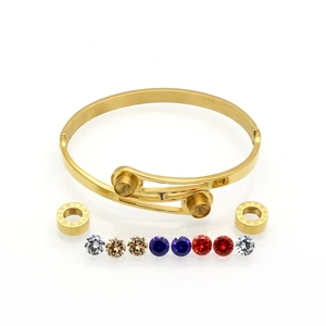Interchangeable gold stainless steel bangle set with Roman numeral rings and multi-color gems