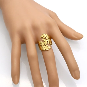 Minimalist golden stainless steel olive leaf open ring worn on a finger