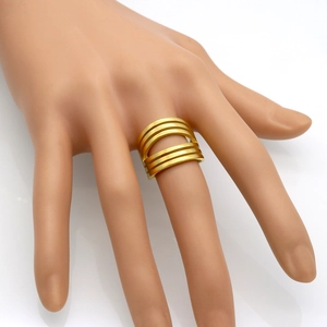 Minimalist wide gold multi-layer band ring with geometric cutout on polished metal