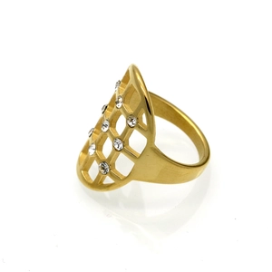 Macro shot of gold shield-shaped hollow mesh ring with sparkling embedded crystals