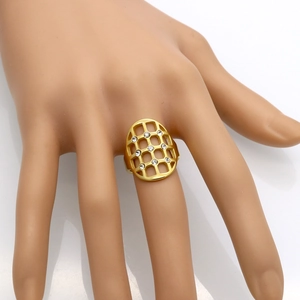 Gold-tone mesh hollow shield ring with sparkling rhinestones worn on finger