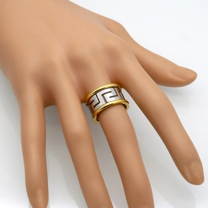 Two-tone stainless steel ring with Greek meander motif and polished gold-plated borders