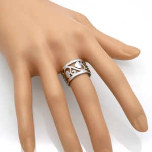 Classic silver stainless steel wide band ring featuring hollow vine and forest patterns