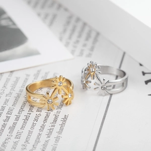 Polished titanium steel sunburst rings with sparkling zircons in gold and silver finish