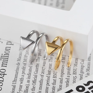 Retro geometric triangle open rings in gold and silver finish with matte arrow detail