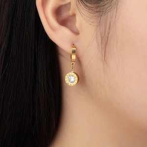 Rose gold roman numeral hoop earrings with a sparkling cubic zirconia center stone