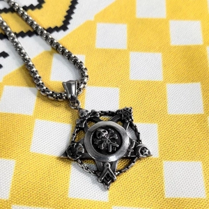 Retro stainless steel star pendant necklace featuring skull motifs and mystic symbols