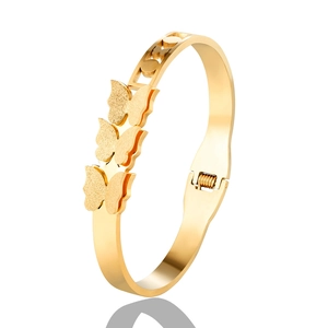 Golden stainless steel butterfly open bracelet with matte finish and hinge closure