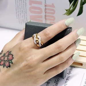 Elegant 18K gold plated stainless steel crisscross ring with pavé cubic zirconia
