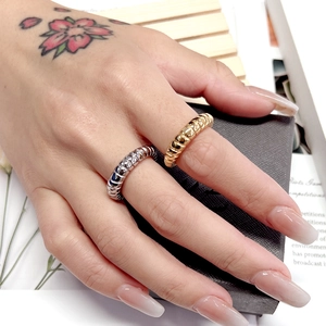 Minimalist 18K gold and silver plated titanium steel rings with textured weave pattern