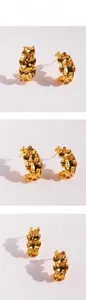 Detailed views of gold wavy C-shaped earrings with modern irregular pleated metal texture