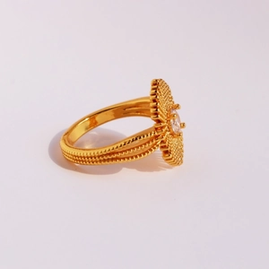 Gold-plated textured ring with beaded details and a sparkling central zircon stone