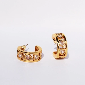 Elegant gold hollow heart earrings with cubic zirconia in a stylish C-shape design