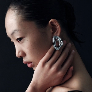 Artistic silver irregular swirling wave earrings with liquid metal texture for women