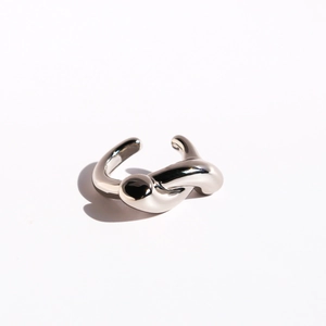Minimalist silver knot ear cuff with creative intertwined lines and polished finish