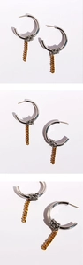 Detail showing two-tone gold and silver chain wrap C-shape hoop earrings from multiple angles