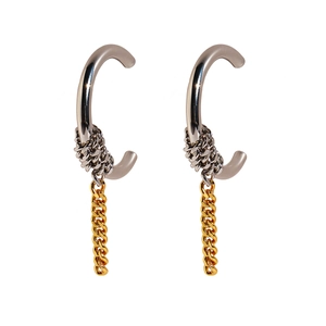 Two-tone C-shaped hoop earrings with silver chain wrap and hanging gold cuban links