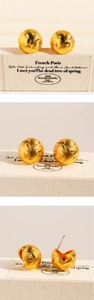 Detailed views showing woven texture on gold ball stud earrings from three angles