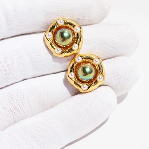 Vintage gold brass stud earrings with spiral texture, opal center and pearls