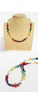 Detailed macro view of colorful irregular natural stone beads and bohemian texture