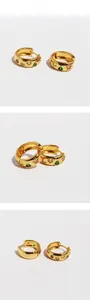 Détails de créoles dorées 18K ornées de zircons multicolores et cristaux scintillants