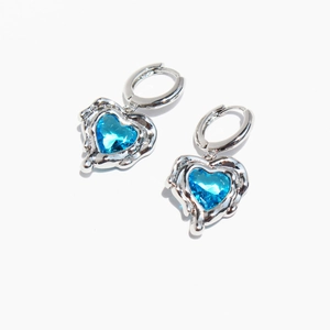 Lava textured silver heart earrings with ocean blue heart-cut zircon gemstones