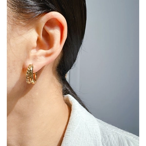 Vintage braided double-layered gold hoop earrings for women shown on model