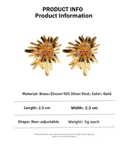 Detail card of gold sunflower earrings showing 2.5cm size and 3g weight specifications