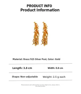 Detail of golden wheat ear earrings crafted from brass with 925 silver needles