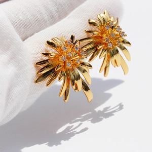 Golden sunflower earrings with zircon center and sparkling fireworks design