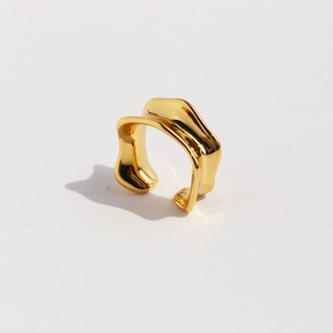 Modern minimalist irregular gold open ring with polished fluid metallic texture