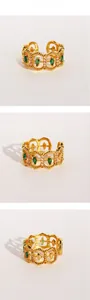 Detail presentation of vintage brass lace ring with marquise emerald cubic zirconia