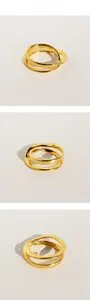 Detailed views of gold geometric irregular layered wave ring from multiple angles