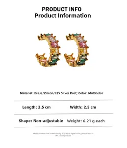 Detailed view of C-shaped rainbow zircon hoop earrings with 2.5cm size and 925 silver pins