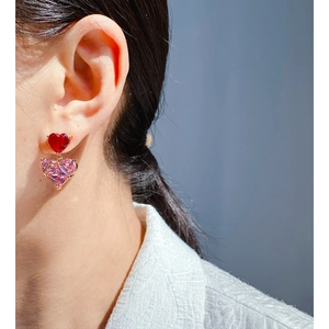 Pink and red heart-shaped zircon drop earrings in gold plating worn by model