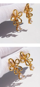 Detailed view of hollow petal earrings with teardrop zircon and centered round diamond