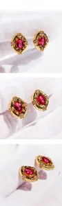 Detailed three-angle view of vintage gold stud earrings with oval red zircon and crystals