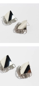 Close-up of S925 silver stamp on geometric rhombus tassel drop earrings detail